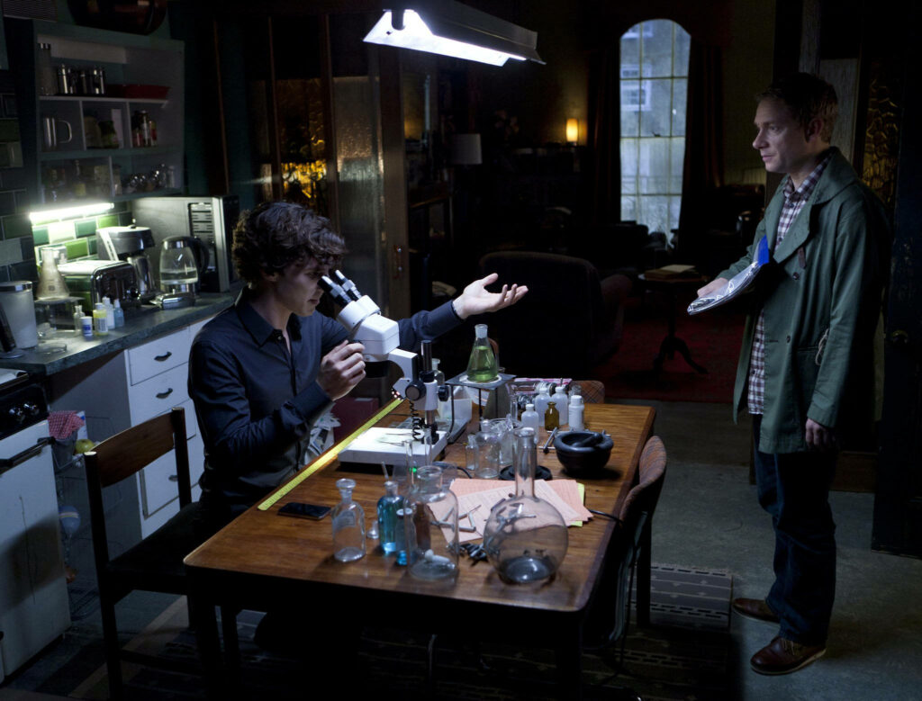 Intriguing Sherlock Holmes & Watson Wallpaper: Iconic First Meeting Scene