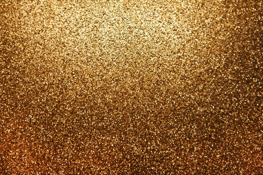 Shimmering Splendor: A HD Wallpaper Background Photo of Glittering Gold Texture