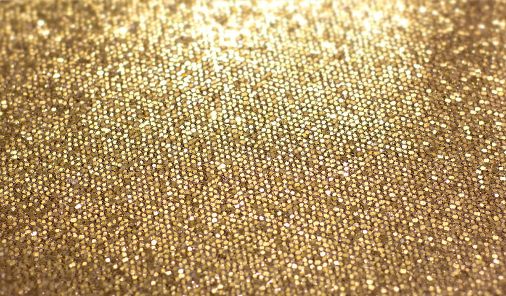 Shimmering Gold: A Glittering Texture for Luxury HD Wallpaper Backgrounds