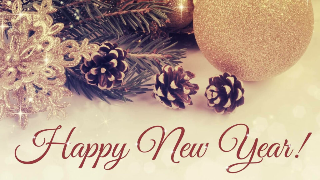 A Glittering Celebration: Shining Gold Flower Ornament with a Pine Tree Branch and Happy New Year Lettering on Faded Yellow Background Wallpaper