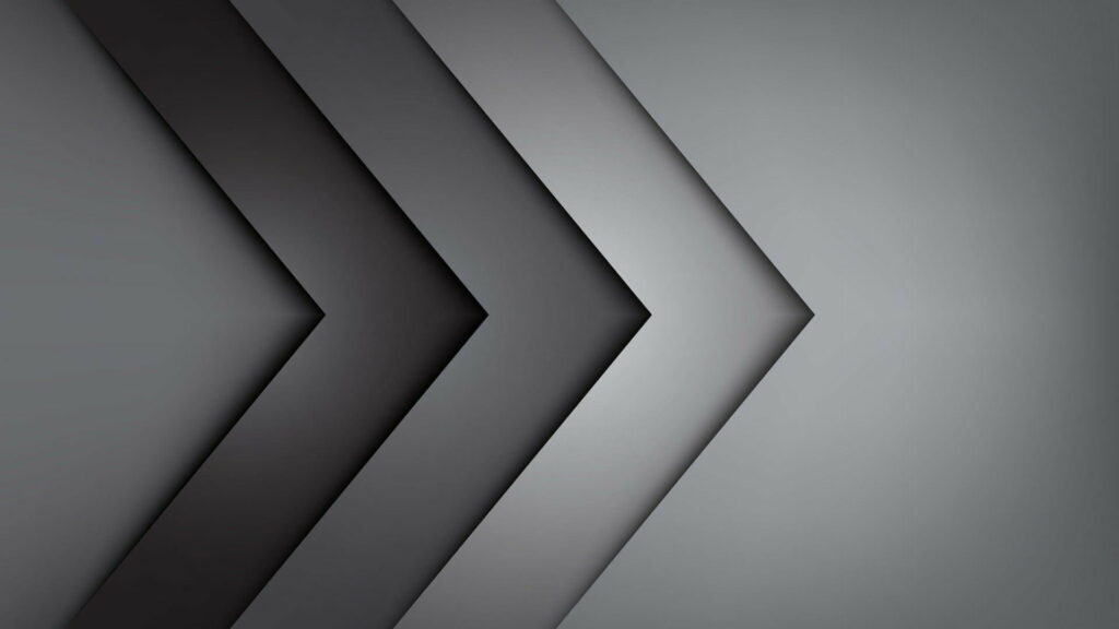 Modern abstract wallpaper with silver grey chevron shapes and smooth gradient 3D effect background