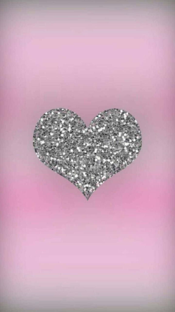 Elegant Shimmering Silver Heart Wallpaper on Soft Pink Gradient
