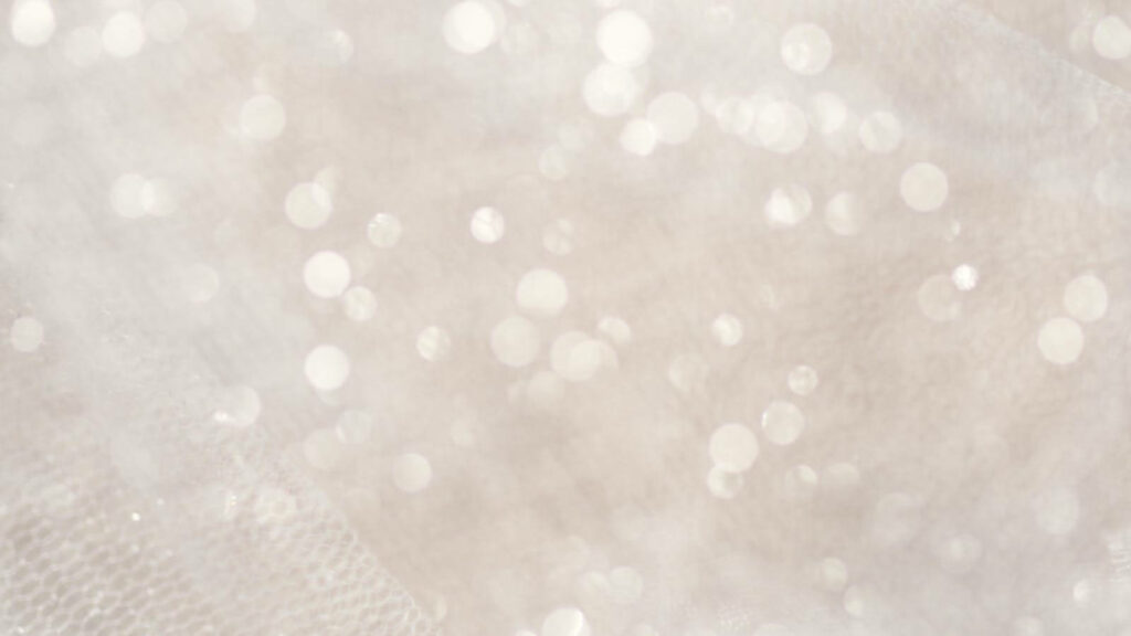 Shimmering Splendor: Captivating Silver Glitter Background Wallpaper