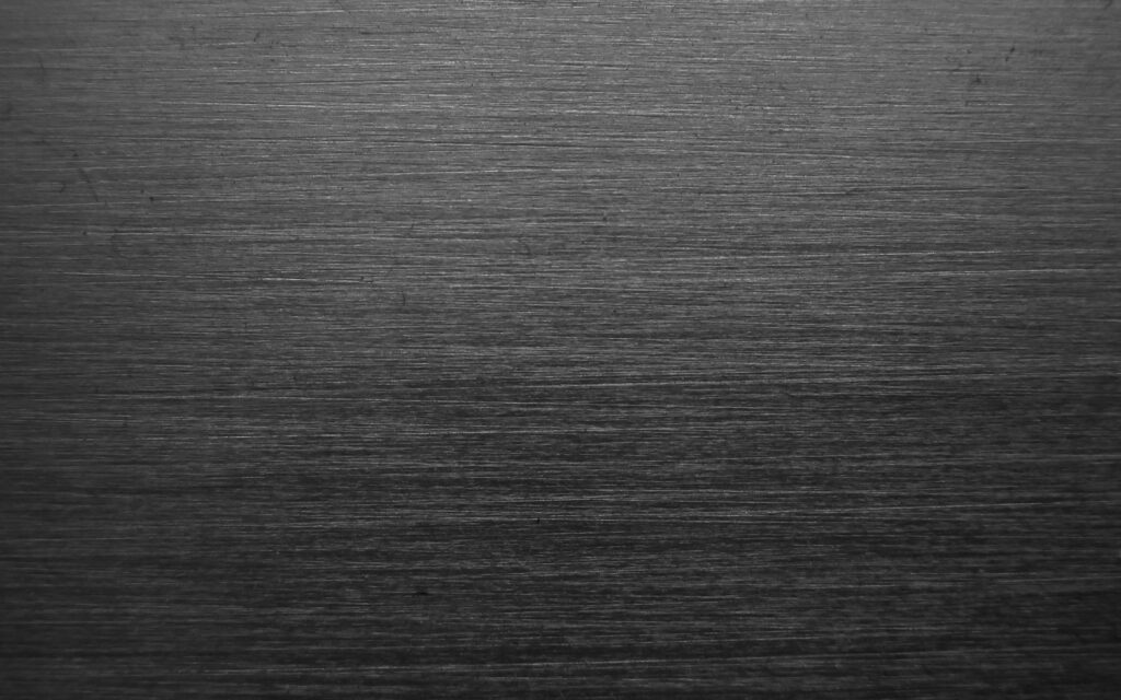 Shades of Steel: A mesmerizing symphony of gray metal patterns in a 4K wallpaper background