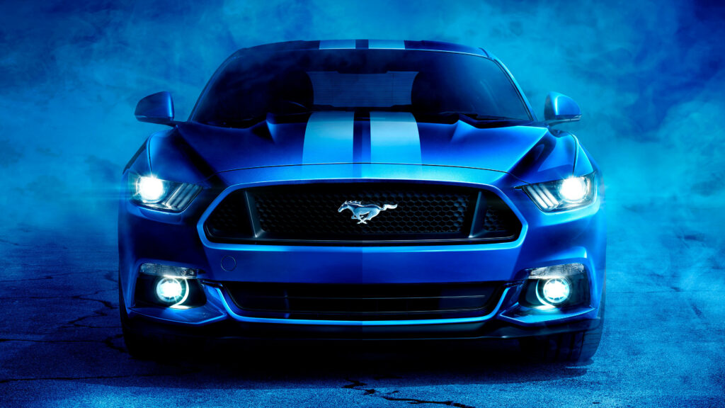 Captivating 4k View: Spectacular Blue Ford Mustang Surfaces Amidst Smoke, Perfect for Windows 11 Devices Wallpaper