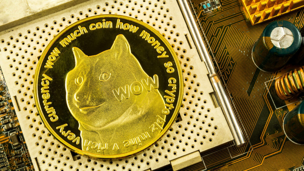 Shiny Dogecoin on computer motherboard with Shiba Inu meme gold coin and tech background wallpaper