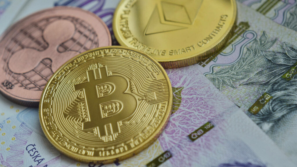 Shiny Ethereum and Bitcoin coins on detailed paper bills showcasing digital versus traditional currency Wallpaper