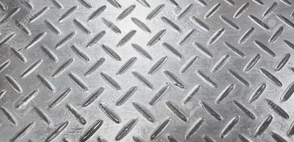 Industrial Metallic Diamond Plate Wallpaper: Rugged Texture Shine