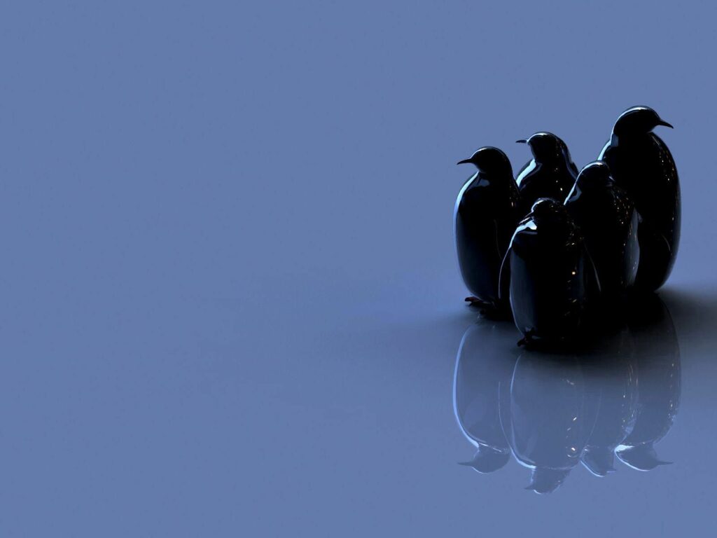 Shiny Toy Penguins on Reflective Surface: Minimalist Blue Wallpaper