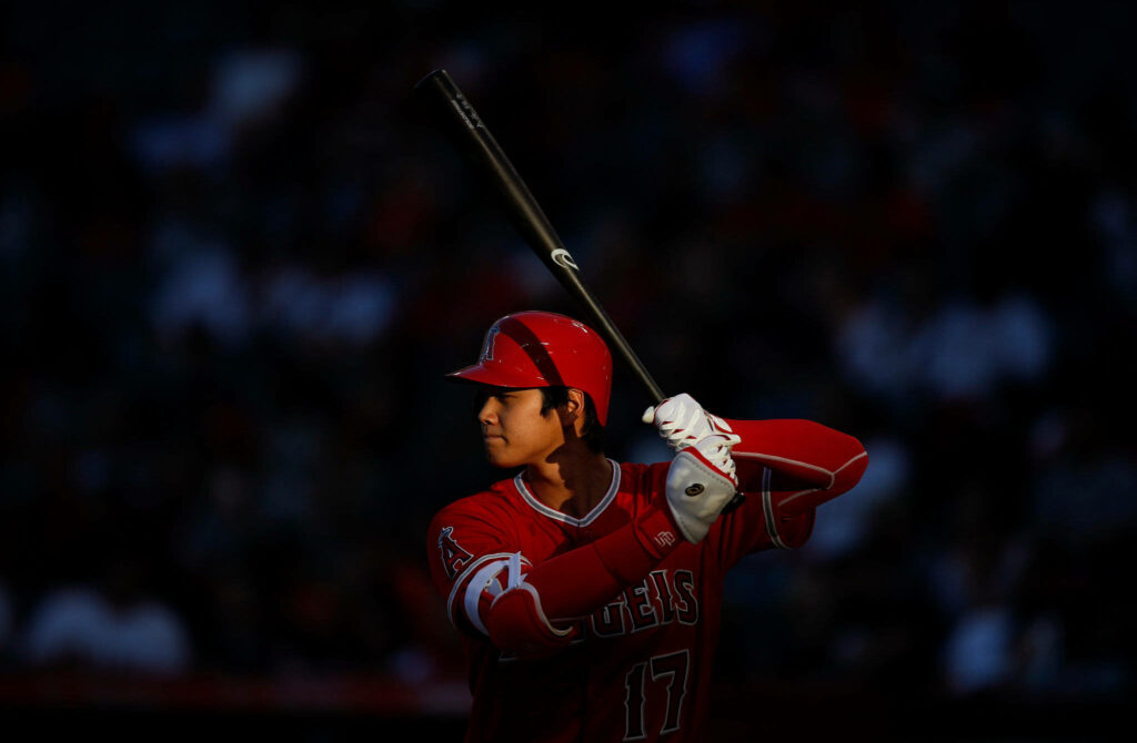 Dynamic Shohei Ohtani Wallpaper: Spotlight Action & Focus