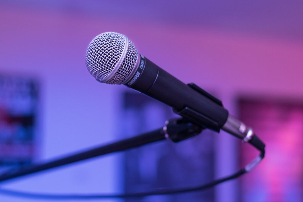 Shure SM58 Microphone Wallpaper: Colorful Music Ambiance Background