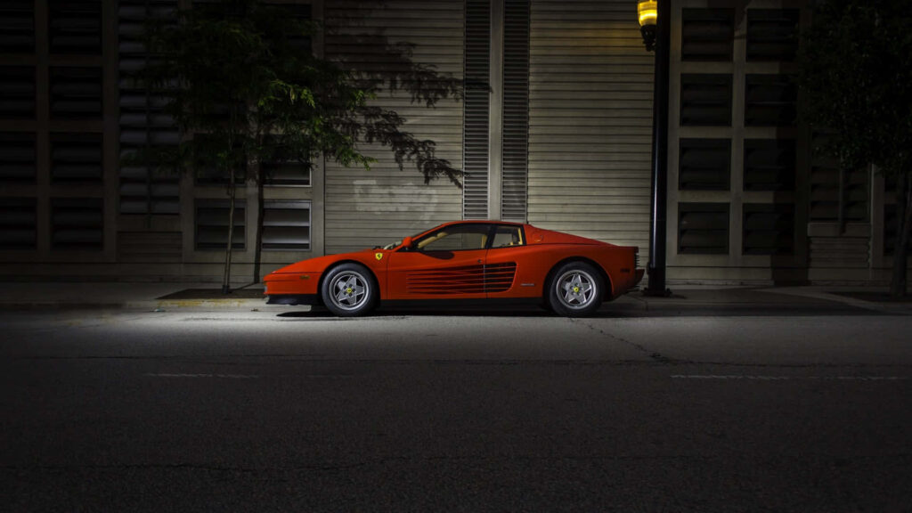 Experiencing Automotive Excellence: Captivating Visuals of the Legendary Classic Ferrari Embodying Opulence and Power Wallpaper