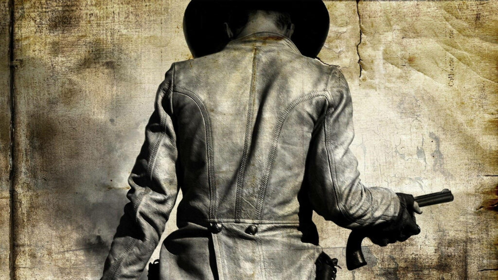 Leather-clad Cowboy in Dramatic Greyscale Portrait Wallpaper