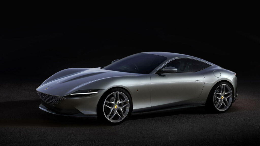 Gleaming Silver Ferrari Roma Balanced in Striking Black Canvas: Ideal Wallpaper Choice