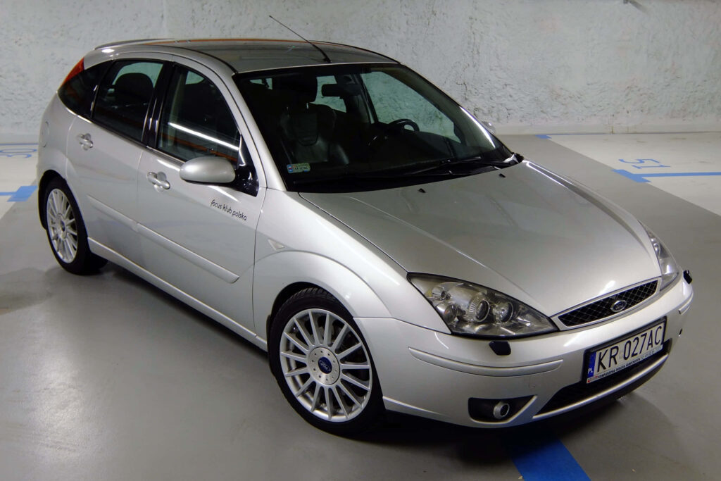 Silver 2013 Ford Focus parked indoors showcasing sleek design modern style detailed wallpaper