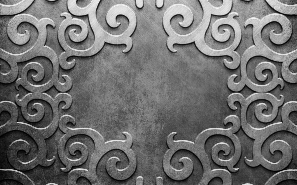 Elegant silver metallic wallpaper with embossed swirling border on brushed metal background