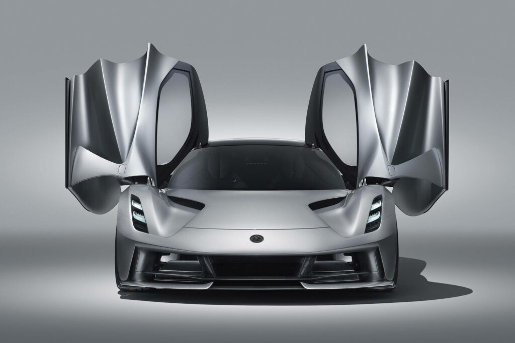 Front view of Silver Lotus Evija with butterfly doors open showcasing luxury electric hypercar design Wallpaper