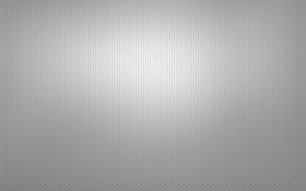 Minimalist QHD wallpaper with metallic silver surface and dark dotted mesh industrial texture background