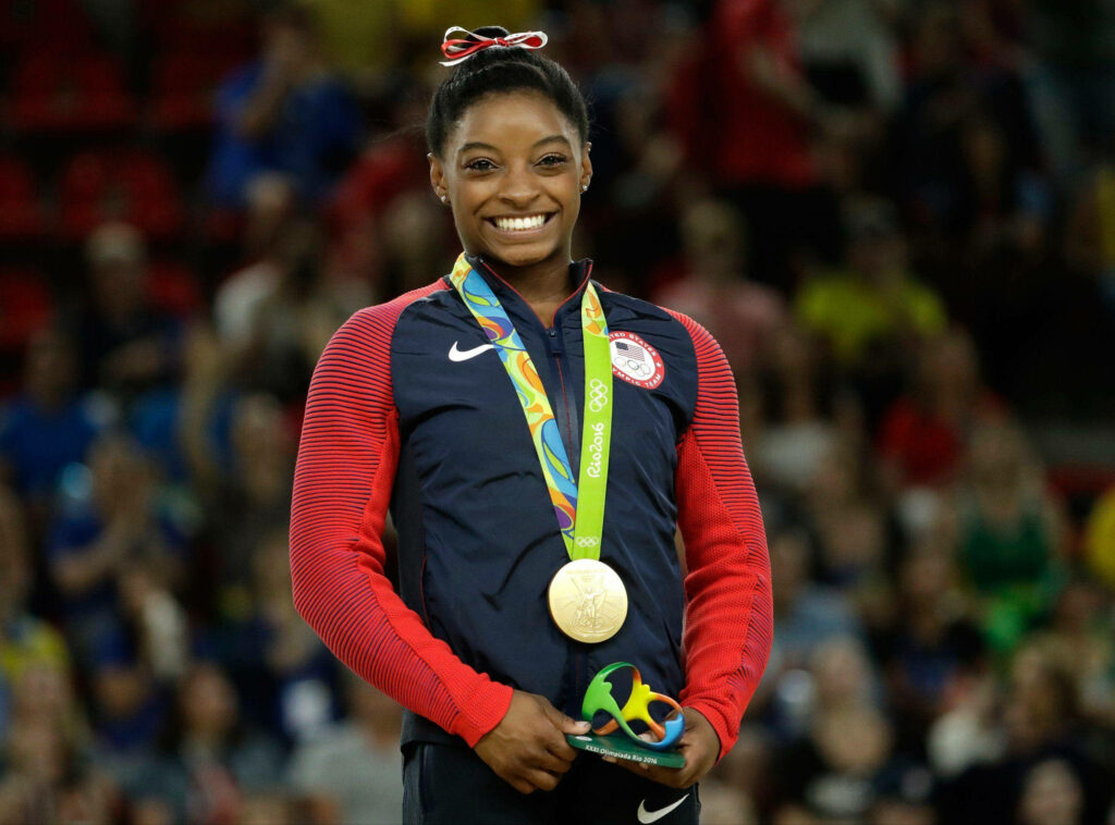 Simone Biles Gold Medal Wallpaper - Rio 2016 Iconic Achievement