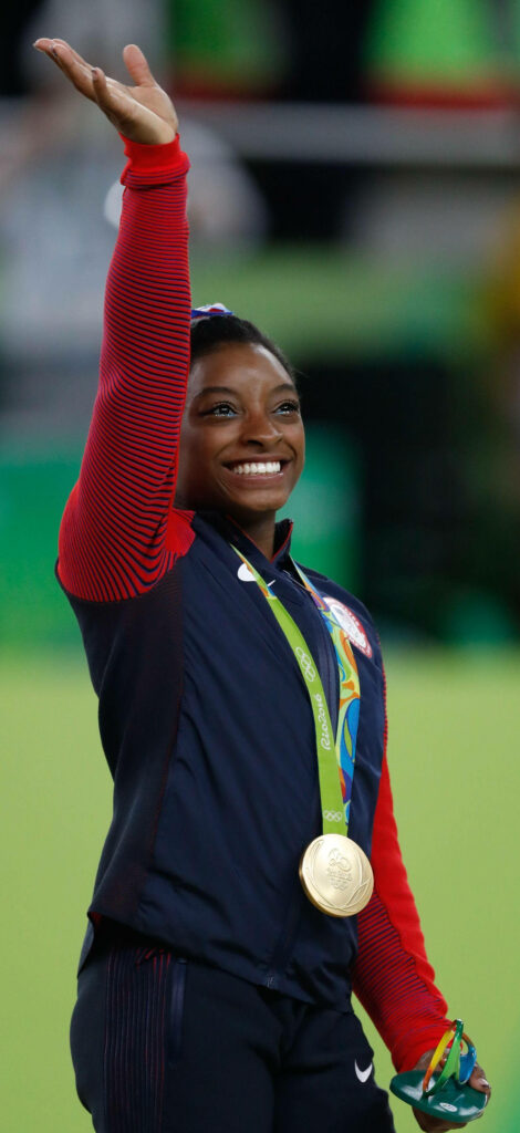 Simone Biles: Triumph & Joy Wallpaper with Medal, Smiling Bright
