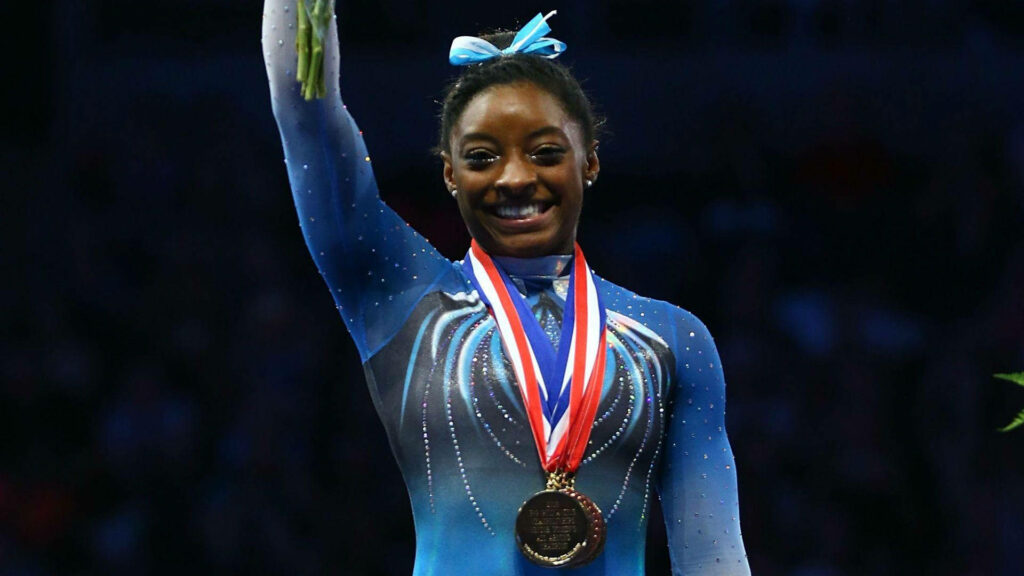 Simone Biles Wallpaper: Celebrate Gymnastics Excellence & Victory