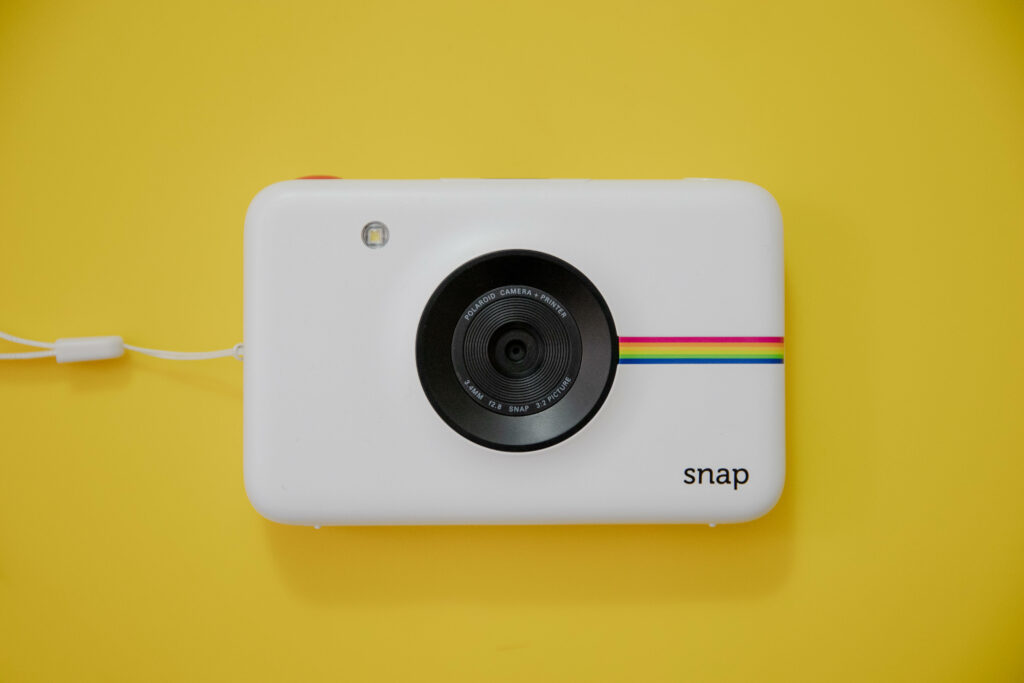 Clean and Simple: Capturing Webcams against a Vibrant Yellow Backdrop Wallpaper