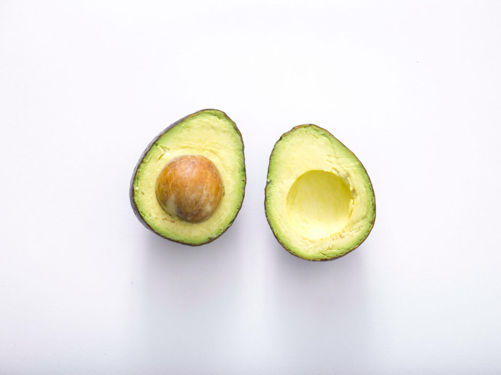 Vibrant and Serene: Captivating Snapshot of Avocado Fruit Splendor on a Fruit-Themed Background Wallpaper