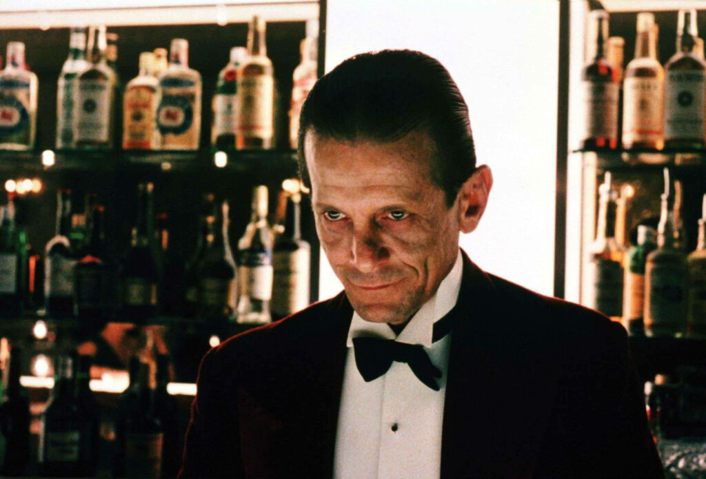 Sinister Bartender from *The Shining* - Chilling Wallpaper Background