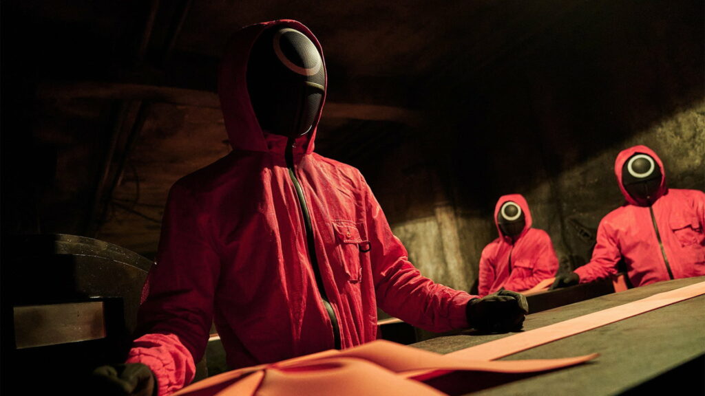 Sinisterly Surreal: The Captivating Red Mask Costume in Squid Game - HD Wallpaper