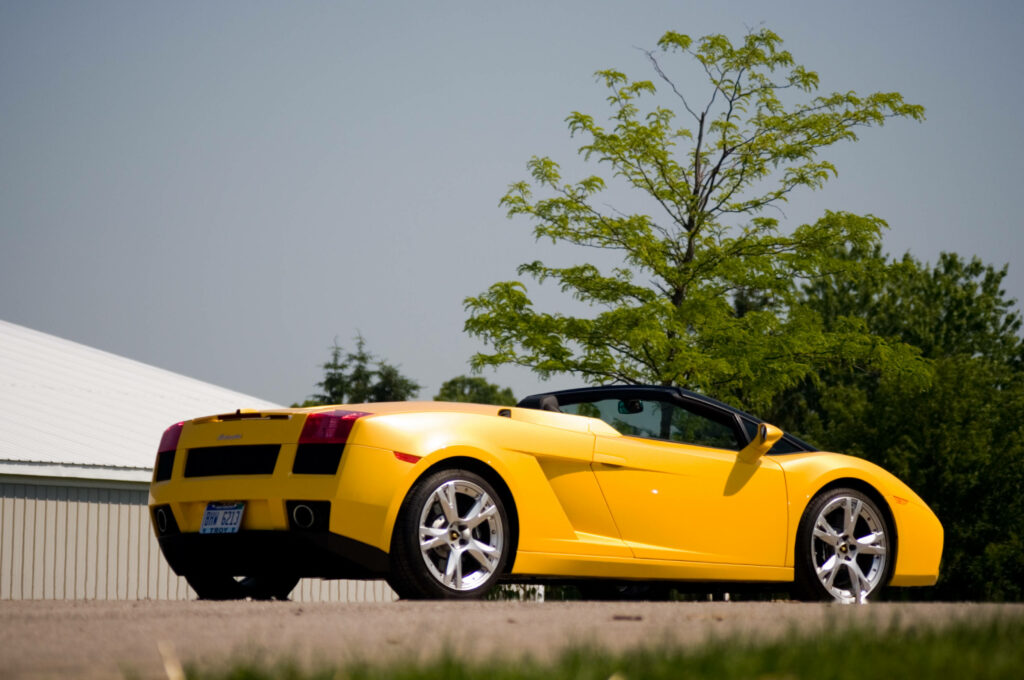Vibrant Yellow Lamborghini Gallardo Spyder in Stunning 4k Background Wallpaper