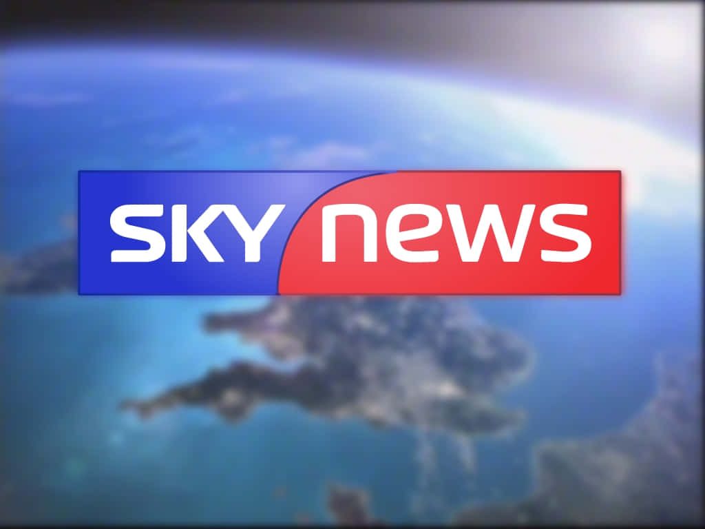 Sky News logo on Earth from space background blue red white broadcast wallpaper design