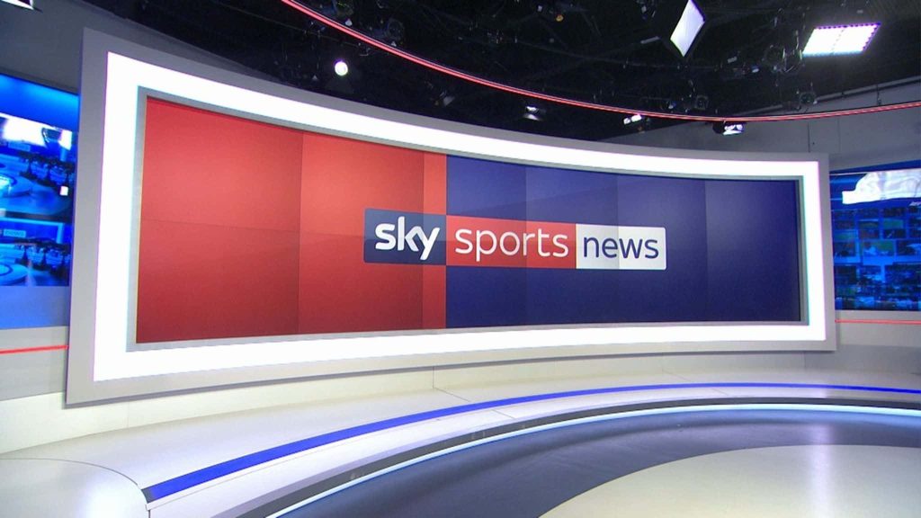 Sky Sports News studio wallpaper featuring red blue curved screen in HD broadcast set
