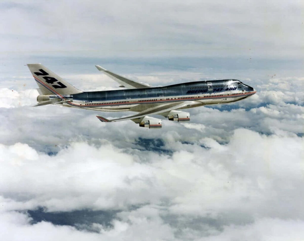Wings of Wonder: Majestic Jumbo Jets Dancing in the Endless Skies Wallpaper