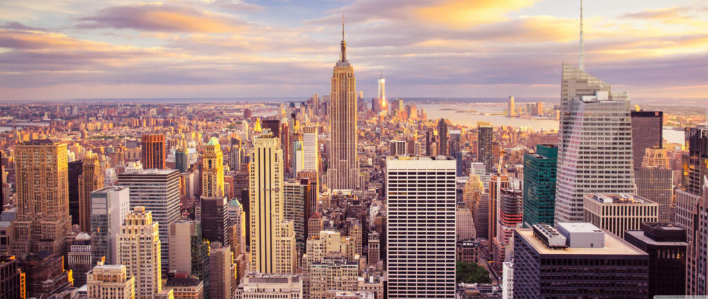 Marveling at Manhattan: Majestic Skyscrapers in New York City's Daytime Splendor - 4k Ultra Widescreen Background Photo Wallpaper