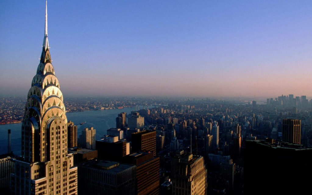 Manhattan Majesty: The Iconic Empire State Building Dominates the Cityscape Wallpaper