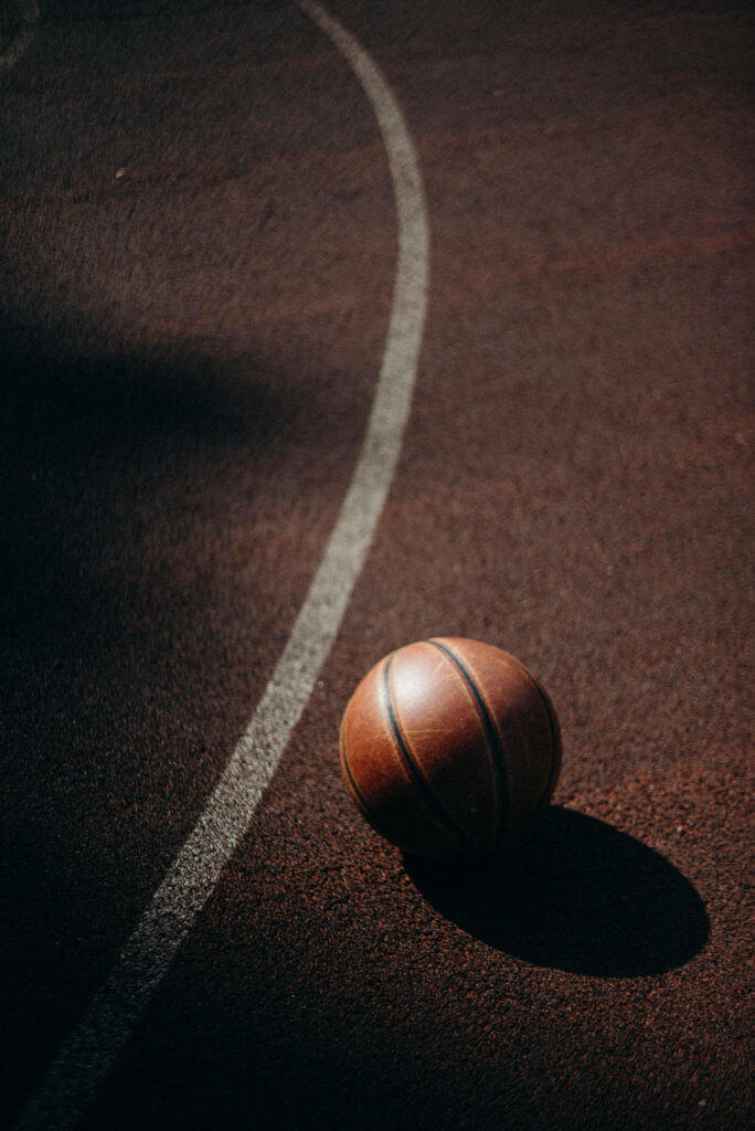 Dribbling through the Concrete: HD Basketball Background Shot Wallpaper