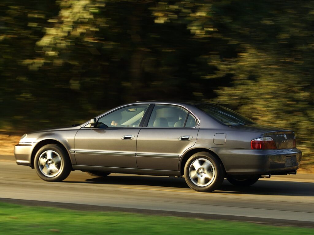 Dynamic Side View of 2002 Acura TL in Stylish Gray Wallpaper