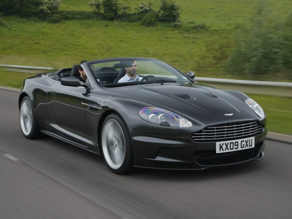 Sleek 2009 Aston Martin DBS Convertible Wallpaper – Scenic Drive
