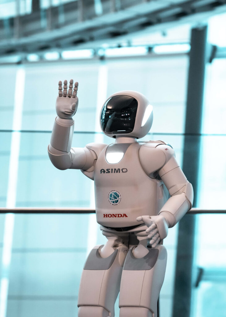 ASIMO by Honda: Modern Robot in Futuristic Tech Wallpaper