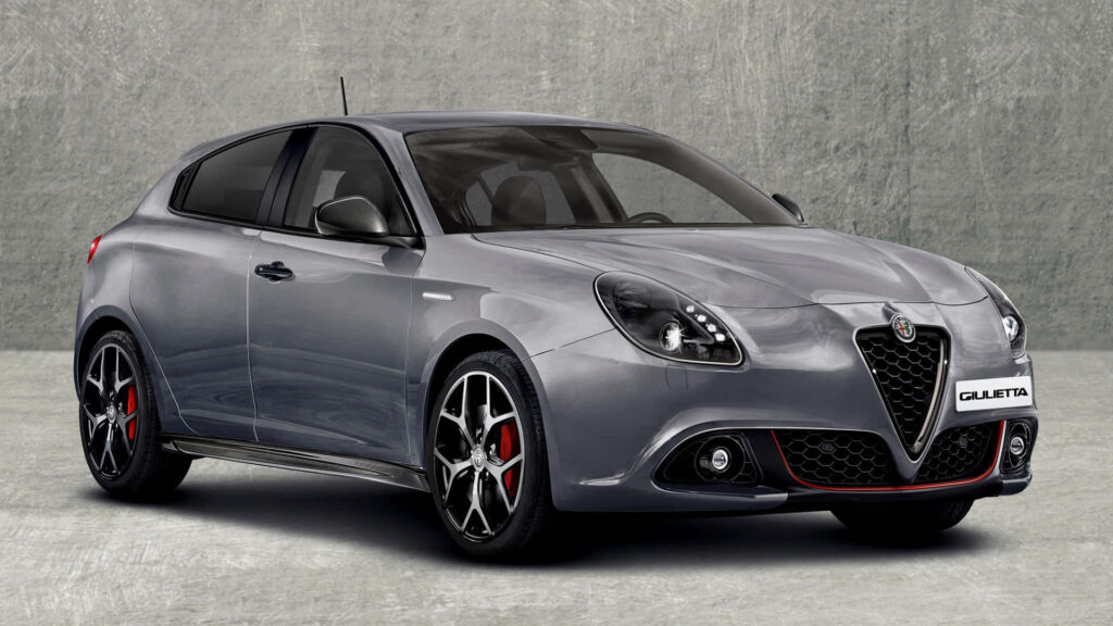 Sleek Alfa Romeo Giulietta with dynamic lines stylish modern sporty car on wallpaper background