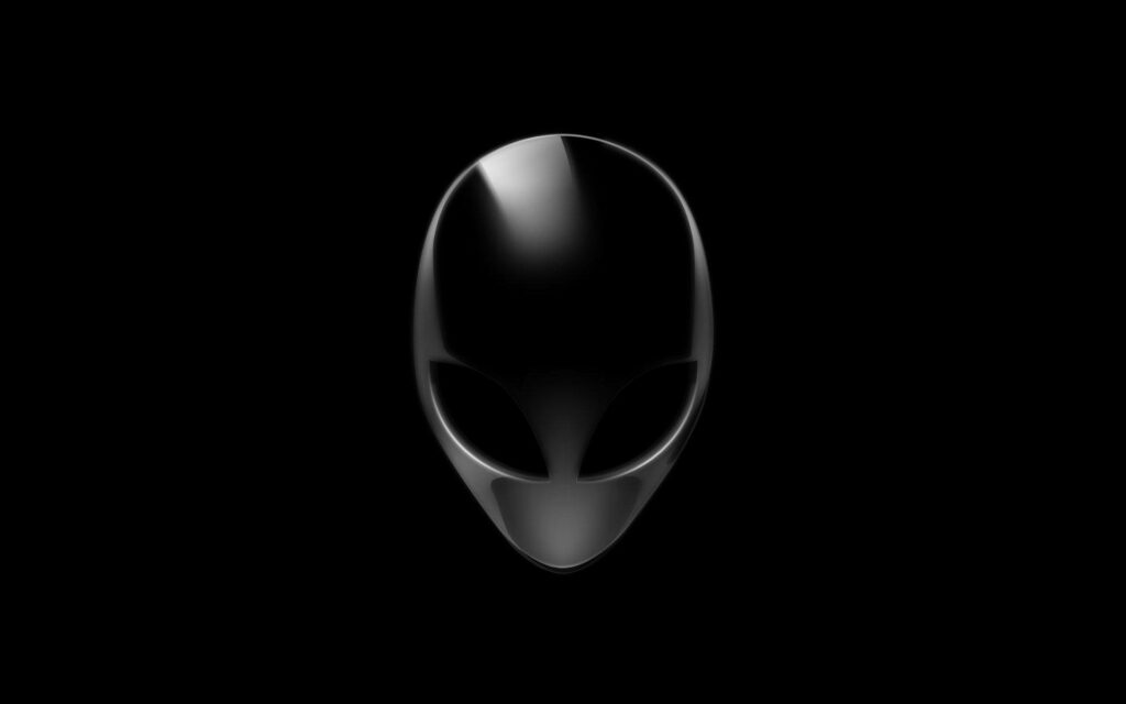 Alienware metallic alien head logo on black background representing advanced gaming technology Wallpaper