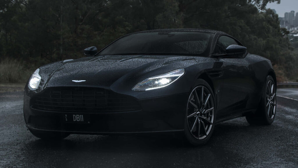 Luxury Aston Martin DB11 Wallpaper: Sleek Elegance in Rain