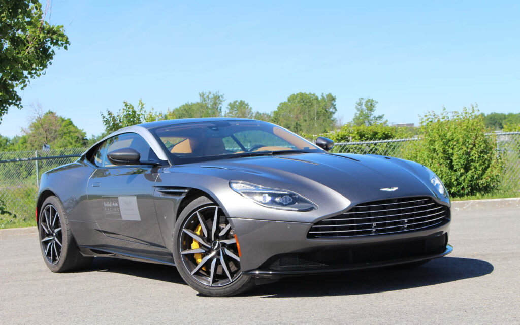 Elegant Aston Martin Wallpaper: Sleek Design & Serene Background
