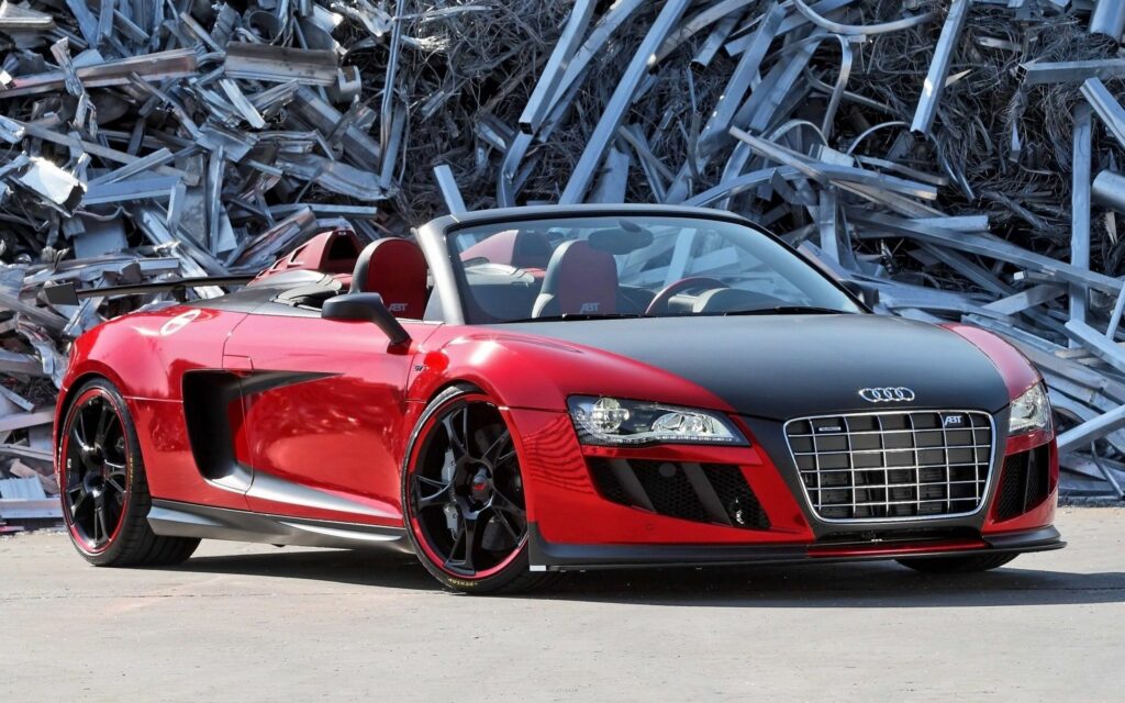 Sleek Audi R8 Convertible Wallpaper: Red & Black with Industrial Backdrop
