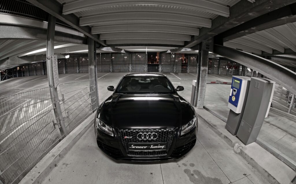 Sleek Audi RS5 Wallpaper: Tuning Modifications in Industrial Setting