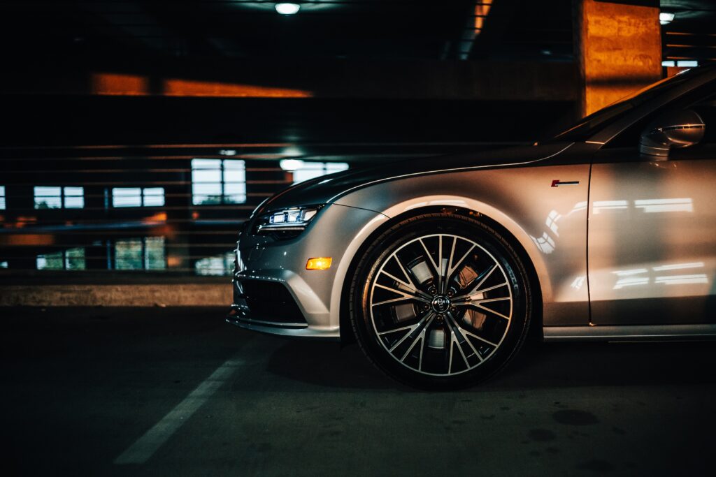 Sleek Audi Side View Wallpaper: Elegant Design & Modern Headlight