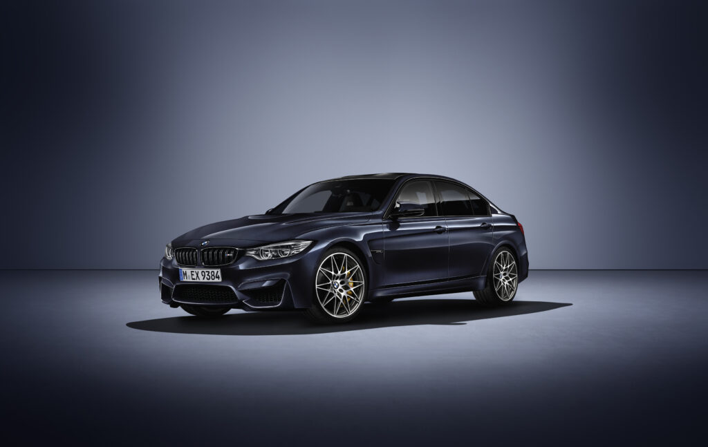 BMW M3 Sleek Side View Wallpaper - Sporty Design & Luxury Background