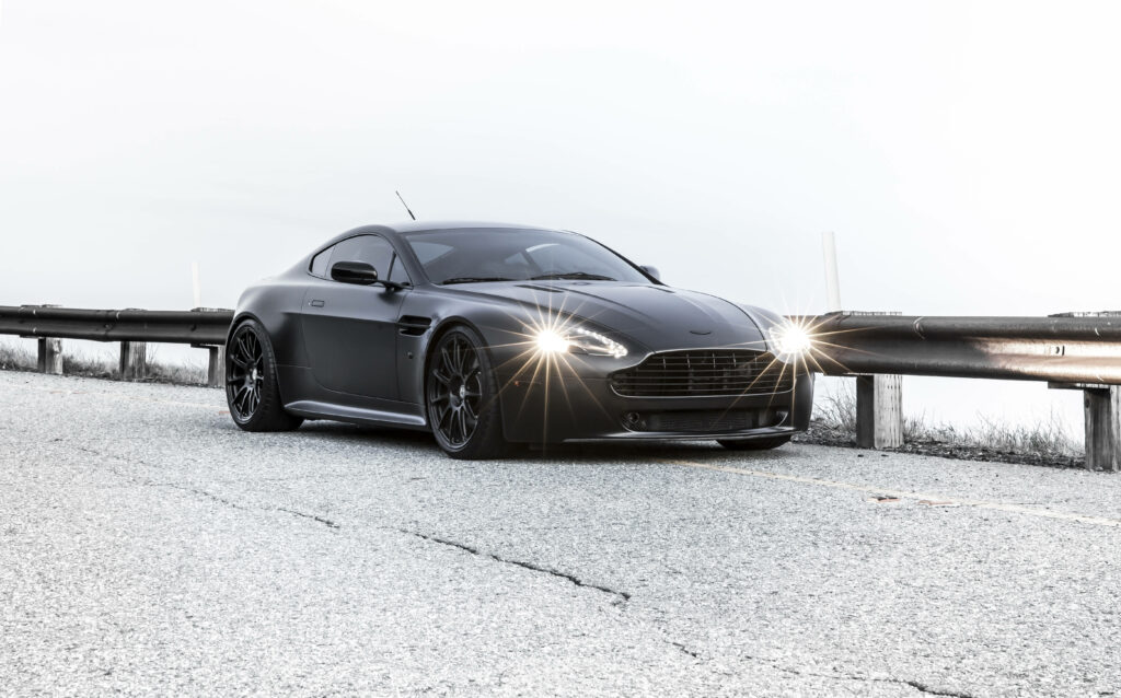 Sleek Black Aston Martin Vantage Wallpaper - Stunning Design & Style