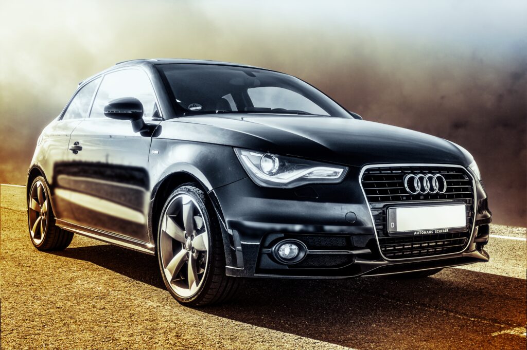 Sleek Black Audi Car Wallpaper with Stylish Blurred Background