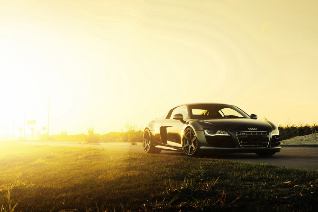 Sleek Black Audi R8 V10 at Sunset - Elegant Side View Wallpaper